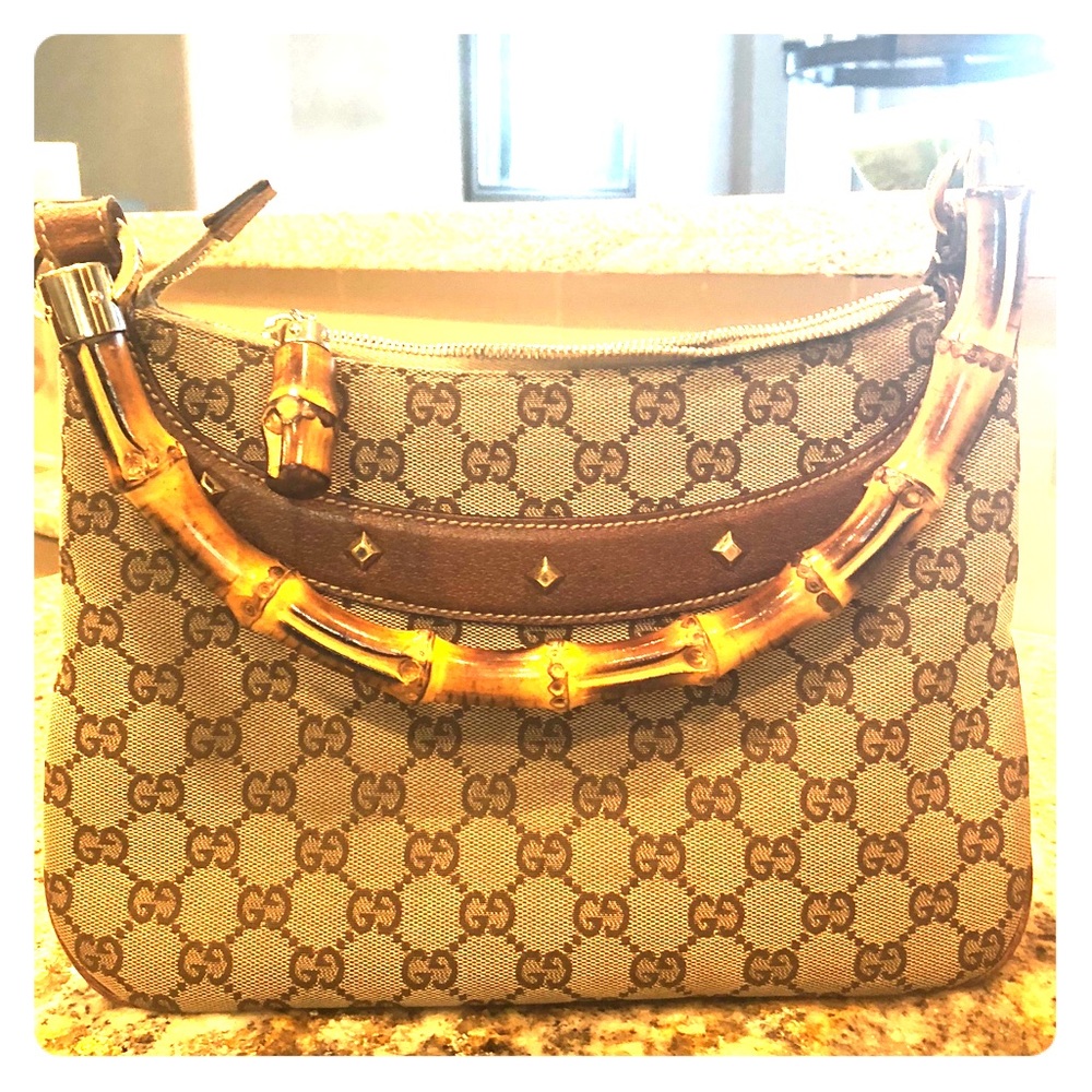 Gorgeous Gucci bamboo handle with gold studs!
